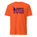 Orange Unisex Halloween t-shirt with “Baddest Witch on the Block” witch-themed design