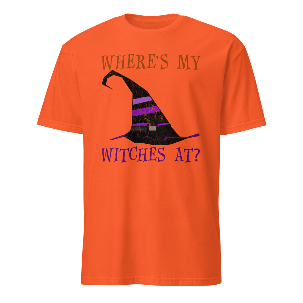 An orange short-sleeve crewneck t-shirt featuring a Halloween graphic with the text 'WHERE'S MY WITCHES AT?' in purple and a black witch hat with purple stripes.