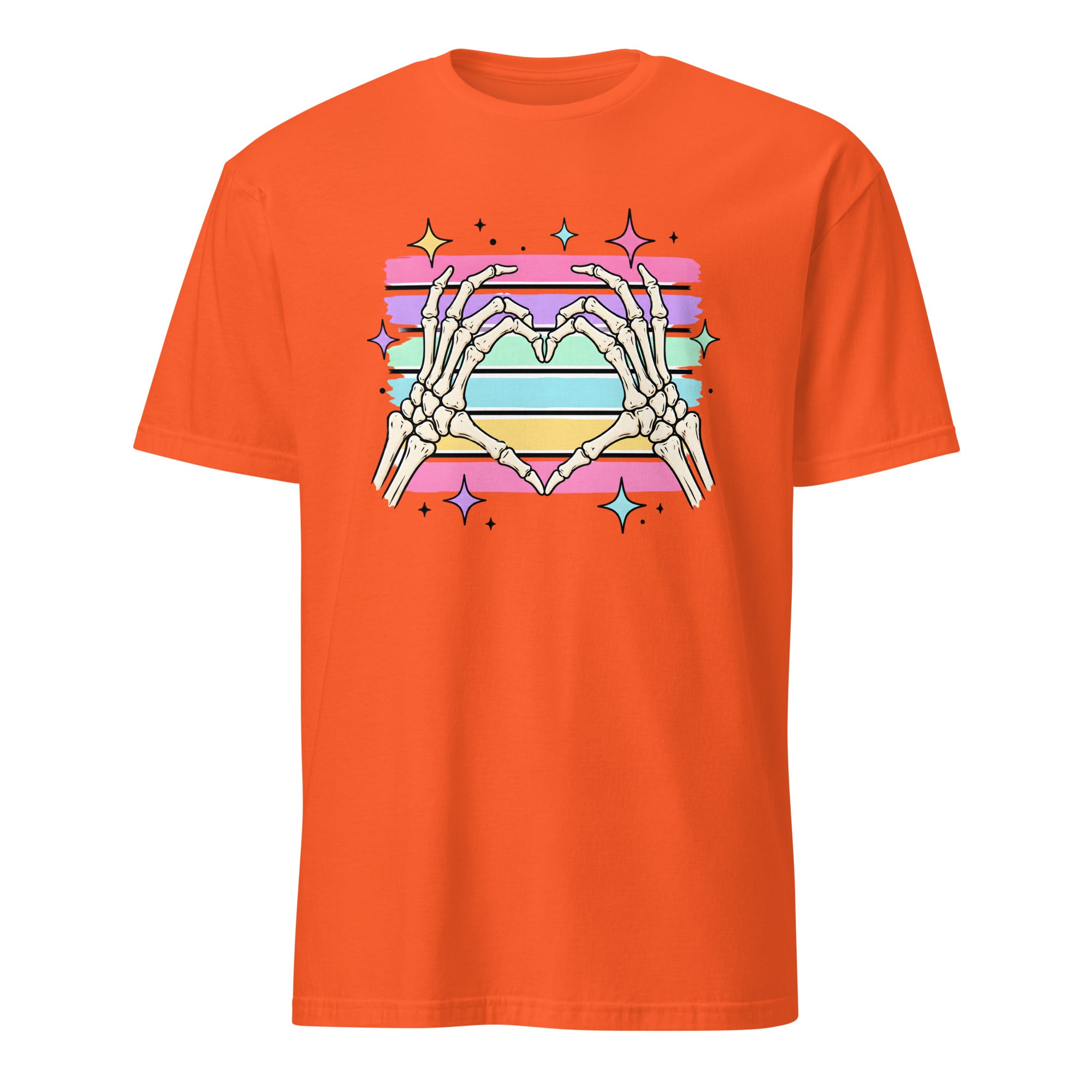 An orange short-sleeve crewneck t-shirt featuring a colorful graphic of skeletal hands forming a heart shape over horizontal pink, purple, blue, and yellow stripes with star accents.
