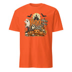 An orange short-sleeve crewneck t-shirt featuring a Halloween graphic on the chest with the text 'BOO Crew' and illustrations of jack-o'-lanterns, a ghost, a witch hat, bats, and a full moon.