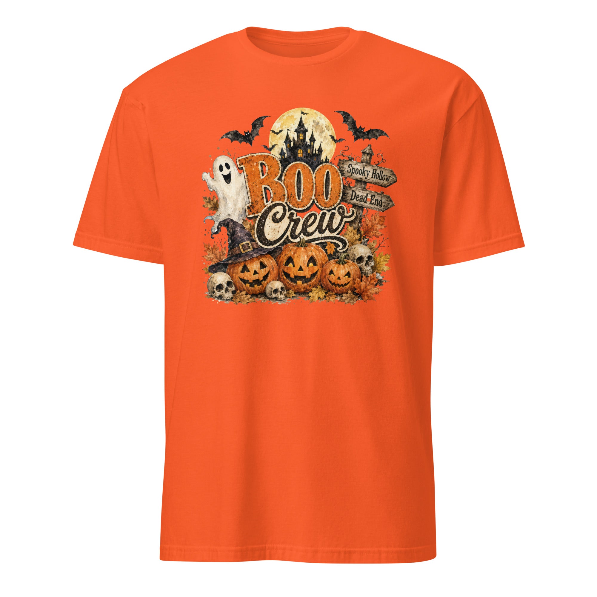 An orange short-sleeve crewneck t-shirt featuring a Halloween graphic on the chest with the text 'BOO Crew' and illustrations of jack-o'-lanterns, a ghost, a witch hat, bats, and a full moon.