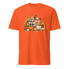An orange short-sleeve crewneck t-shirt featuring a central autumn graphic of pumpkins, sunflowers, and a plaid-patterned pumpkin on a white background.