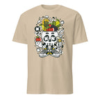 Sand t-shirt with a skull design wearing sneakers and surrounded by fruits on a white background