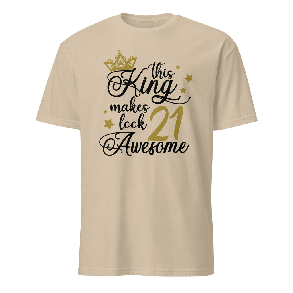 Sand t-shirt with black and gold "This King Makes 21 Look Awesome" text design on a white background