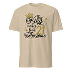 Sand t-shirt with black and gold "This King Makes 21 Look Awesome" text design on a white background