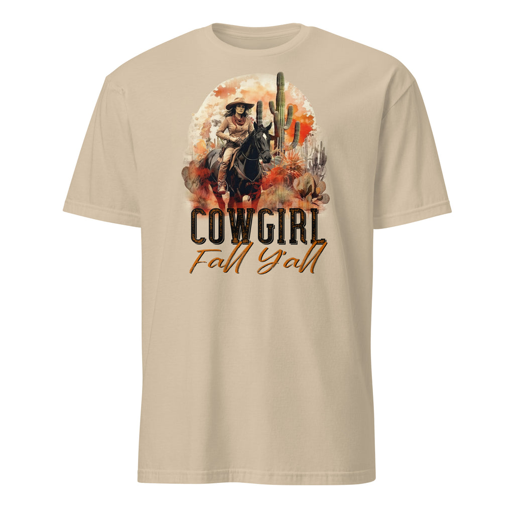 Sand t-shirt with a graphic of a cowgirl and text 'Cowgirl Fall Y'all' on a white background