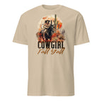 Sand t-shirt with a graphic of a cowgirl and text 'Cowgirl Fall Y'all' on a white background