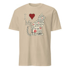 Beige t-shirt with a cat-themed graphic and text on a white background