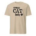 Beige t-shirt with 'crazy CAT lady' text and paw print on a white background