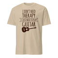 Sand t-shirt with text 'I don't need therapy, I just need to play guitar' on a white background