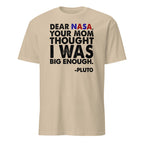 Beige t-shirt with humorous text about Pluto addressing NASA on a white background