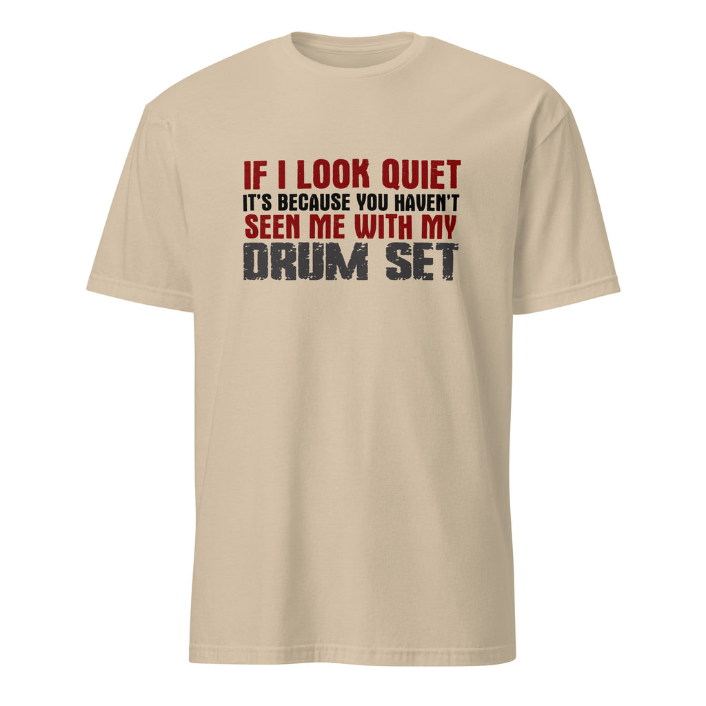 Beige t-shirt with humorous text design on a white background