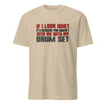 Beige t-shirt with humorous text design on a white background