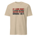 Beige t-shirt with humorous text design on a white background