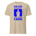 Beige t-shirt with blue graphic and text 'Stay safe at night, sleep with a nurse' on a white background