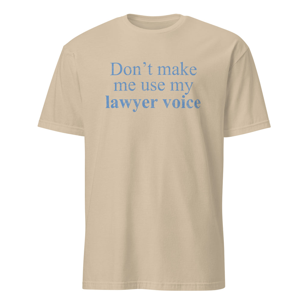 Beige t-shirt with a small red logo on a white background