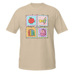 A beige short-sleeve crewneck t-shirt featuring a colorful graphic print on the chest. The graphic is divided into four quadrants with cute school-themed illustrations: a smiling red apple, a yellow bow tie, books, and a pink backpack, with the text 'happy to your face!'.