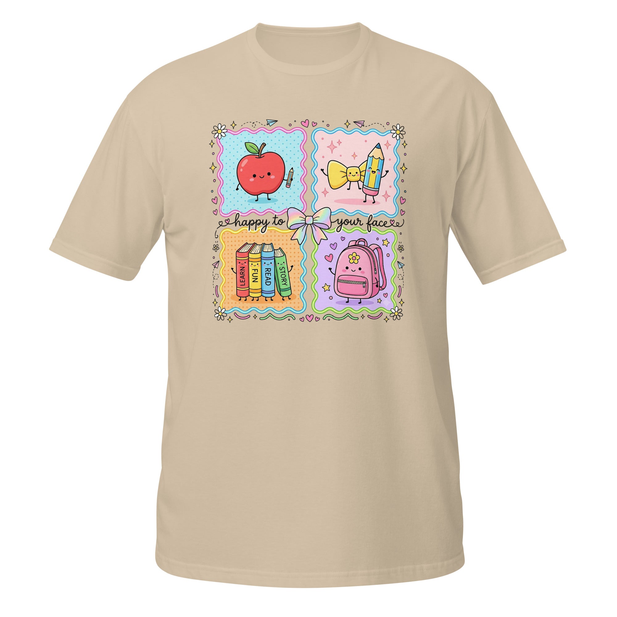 A beige short-sleeve crewneck t-shirt featuring a colorful graphic print on the chest. The graphic is divided into four quadrants with cute school-themed illustrations: a smiling red apple, a yellow bow tie, books, and a pink backpack, with the text 'happy to your face!'.