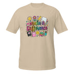A beige short-sleeve t-shirt with a colorful graphic on the chest that reads 'Make A Difference' surrounded by school-themed doodles like a lightbulb, flowers, a ruler, a pencil, notebooks, and a smiley face.