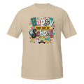 A beige short-sleeve crewneck t-shirt featuring a colorful 'Happy First Day of School' graphic on the chest, displayed against a solid white background.