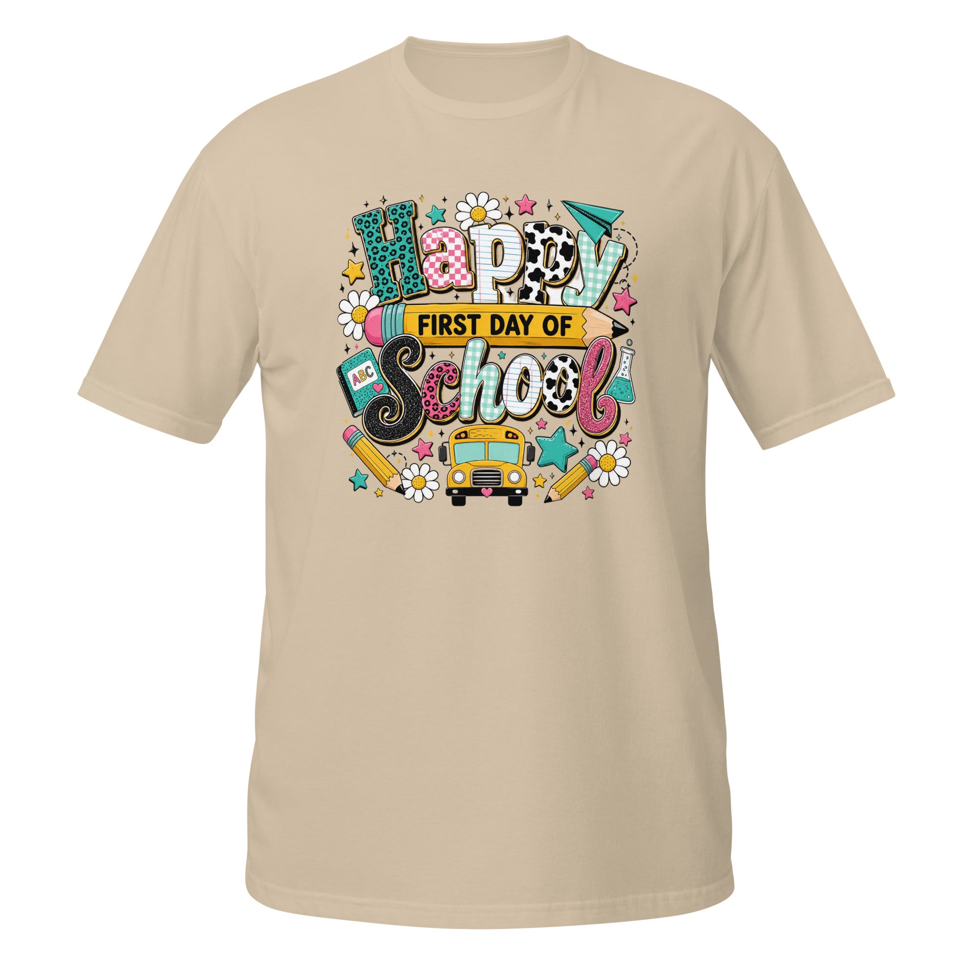 A beige short-sleeve crewneck t-shirt featuring a colorful 'Happy First Day of School' graphic on the chest, displayed against a solid white background.