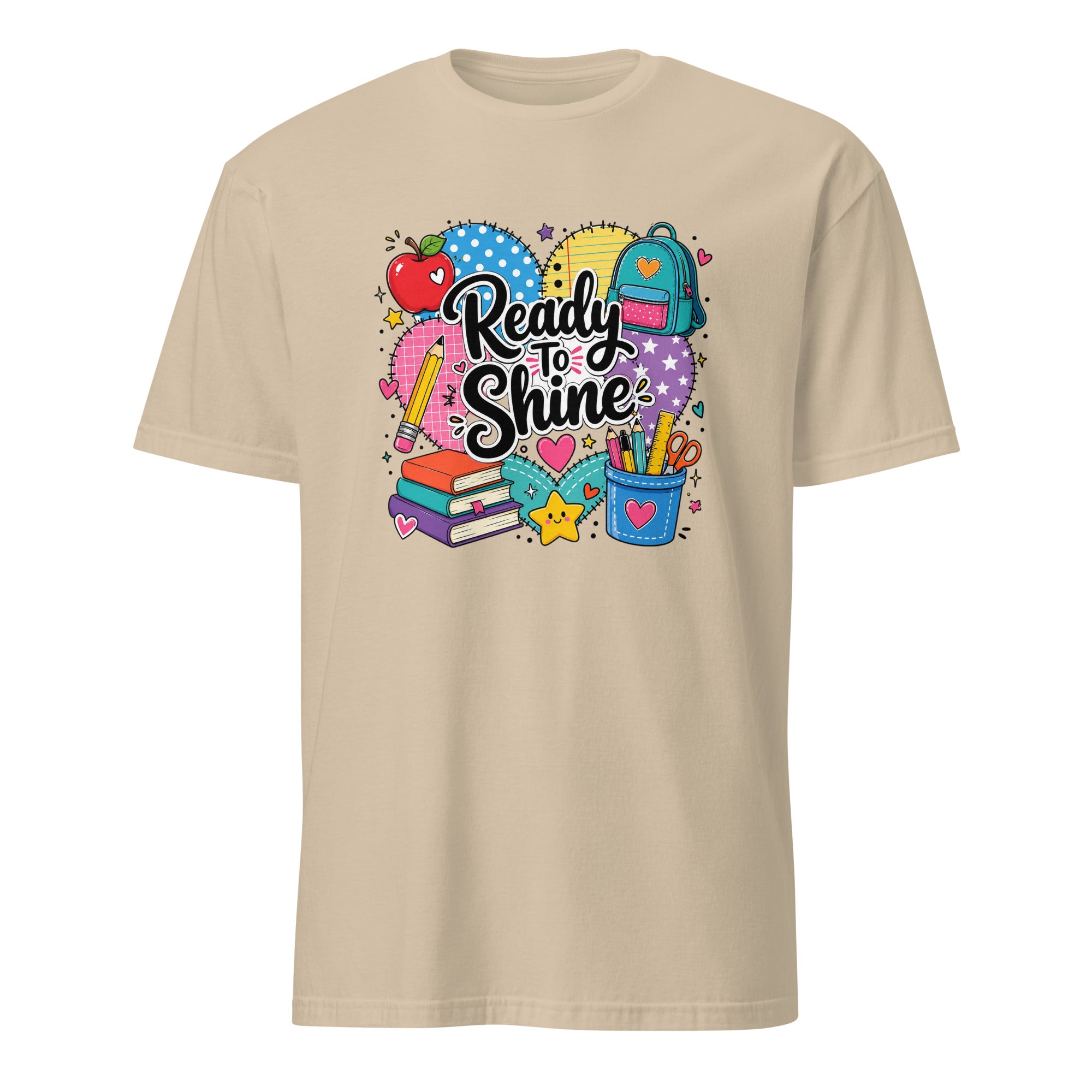 A beige short-sleeve crewneck t-shirt featuring a colorful graphic on the chest with school-themed illustrations and the text 'Ready to Shine'.