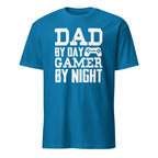 Blue t-shirt with white text 'DAD BY DAY GAMER BY NIGHT' on a white background