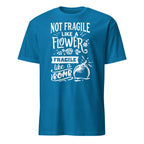 Blue t-shirt with white Not Fragile Like A Flower Fragile Like A Bomb text and graphic on a white background