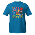 A bright blue short-sleeve t-shirt with a colorful cartoon school supplies graphic on the front, displayed against a solid white background.