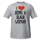 Gray t-shirt with 'I ❤️ BEING A BLACK WOMAN' text on a white background