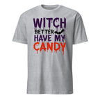 A sport grey short-sleeve t-shirt with a Halloween-themed graphic text reading 'WITCH BETTER HAVE MY CANDY' in purple, black, and orange dripping fonts, with a small bat silhouette, on a plain white background.