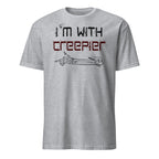 A sport grey short-sleeve t-shirt with a graphic print on the chest that reads 'I'm with creeper' in black and dark red distressed lettering, above a black skeletal arm pointing forward, shown on a plain white background.