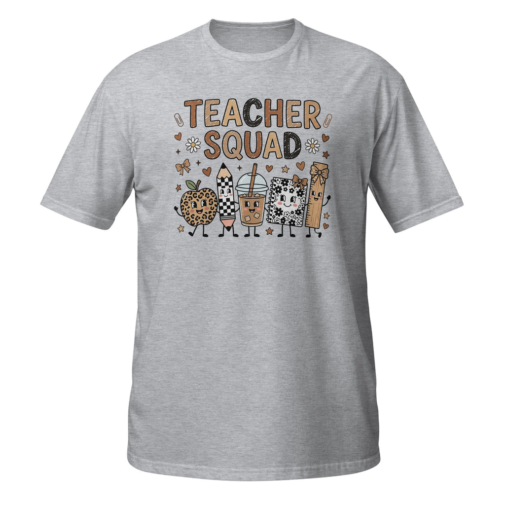 A heather gray short-sleeve t-shirt with a 'TEACHER SQUAD' graphic on the chest, featuring cute cartoon drawings of a leopard-print apple, a checkered pencil, a coffee cup, a cat-shaped highlighter, and a pencil case.