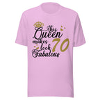 Lilac t-shirt with text 'This Queen makes 70 look fabulous' on a white background