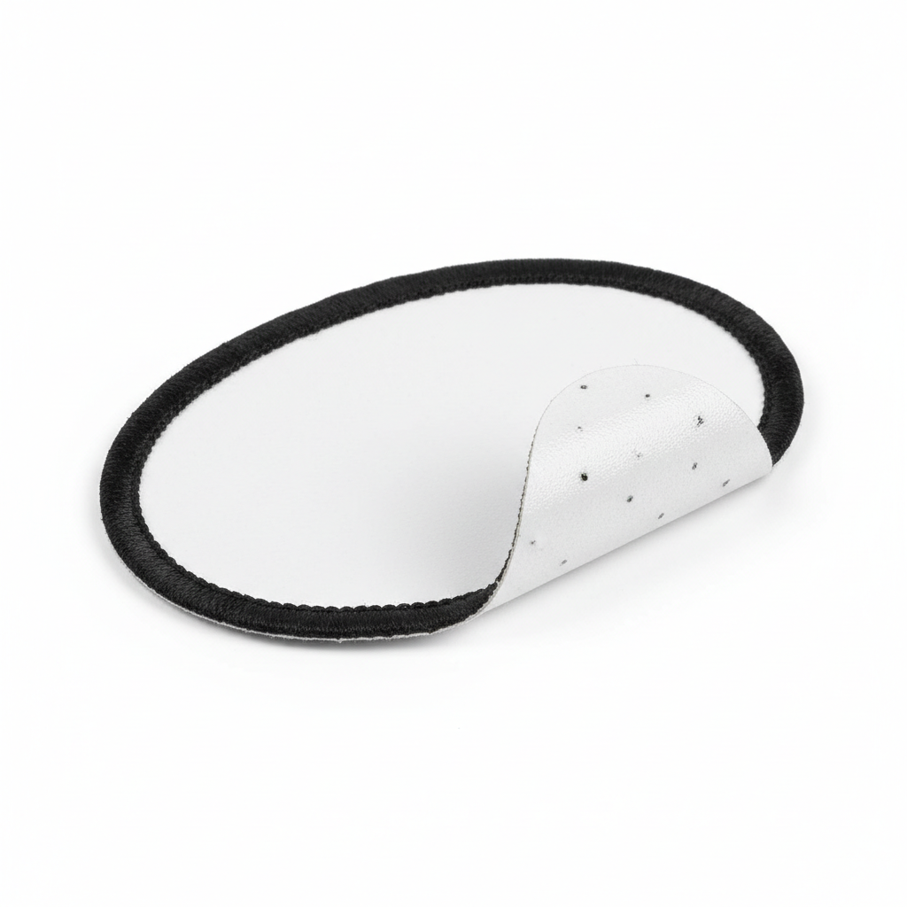 Want something a little different than the standard square/rectangle patch? This 3 1/2" x 2 1/2" oval sublimatable patch gives your design a clean, classic badge look—finished with a bold black border and a peel-and-stick adhesive backing for quick application (no sewing required).
The sublimation-ready surface is made for vibrant, full-color printing, so it’s perfect for logos, event patches, clubs, teams, reunions, and branded merch. Stick it on jackets, backpacks, hats, uniforms, or promo gear and you’ve